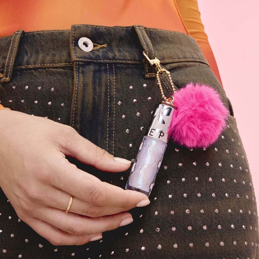 OUTRAGEOUS PLUMP EFFECT-25 XMS (BRILLO LABIAL INCLUYE UN POMPÓN ROSA)